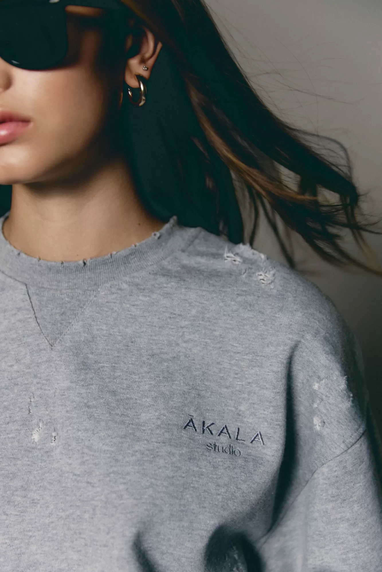 The Akala Studio Sweats-Distressed Grey Sweater